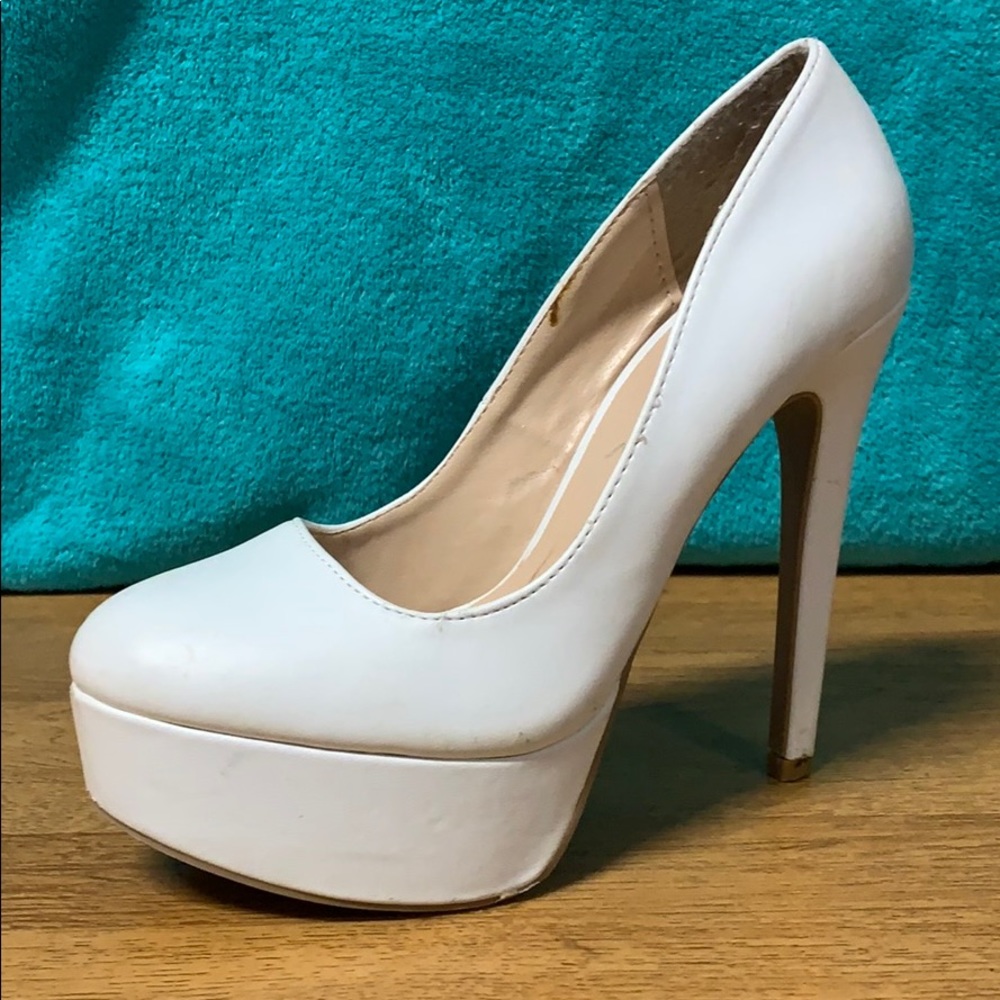 Size 7 • solid white closed toe heel — worn once